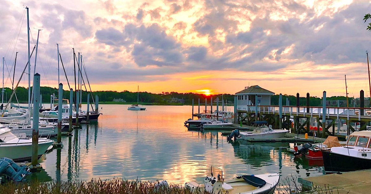 Connecticut harbor with boats and a beautiful sunset