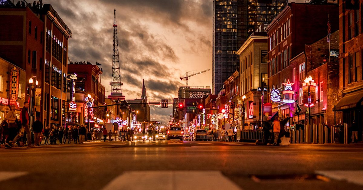 Downtown Nashville nightlife with city lights and traffic in Tennessee